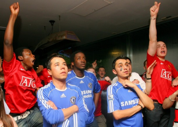 31 Manchester United and Chelsea fans watching a televised game at Nevada Smith’s pub in New York City